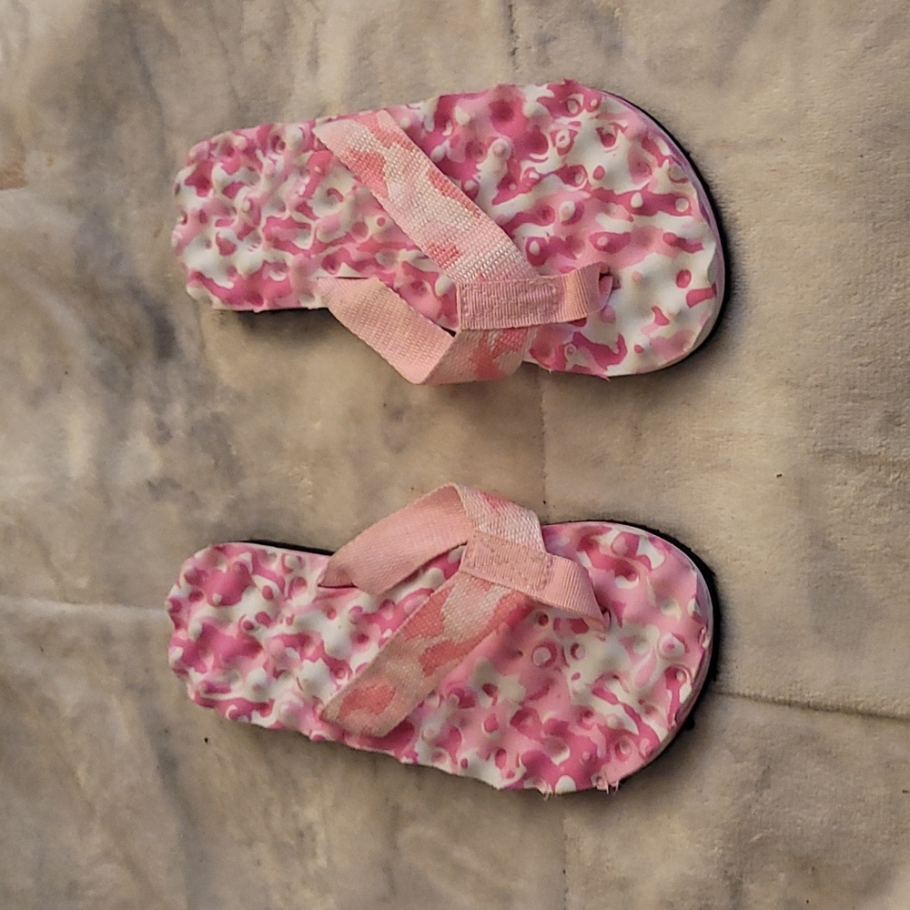Never worn pink and white camouflage print flip flops